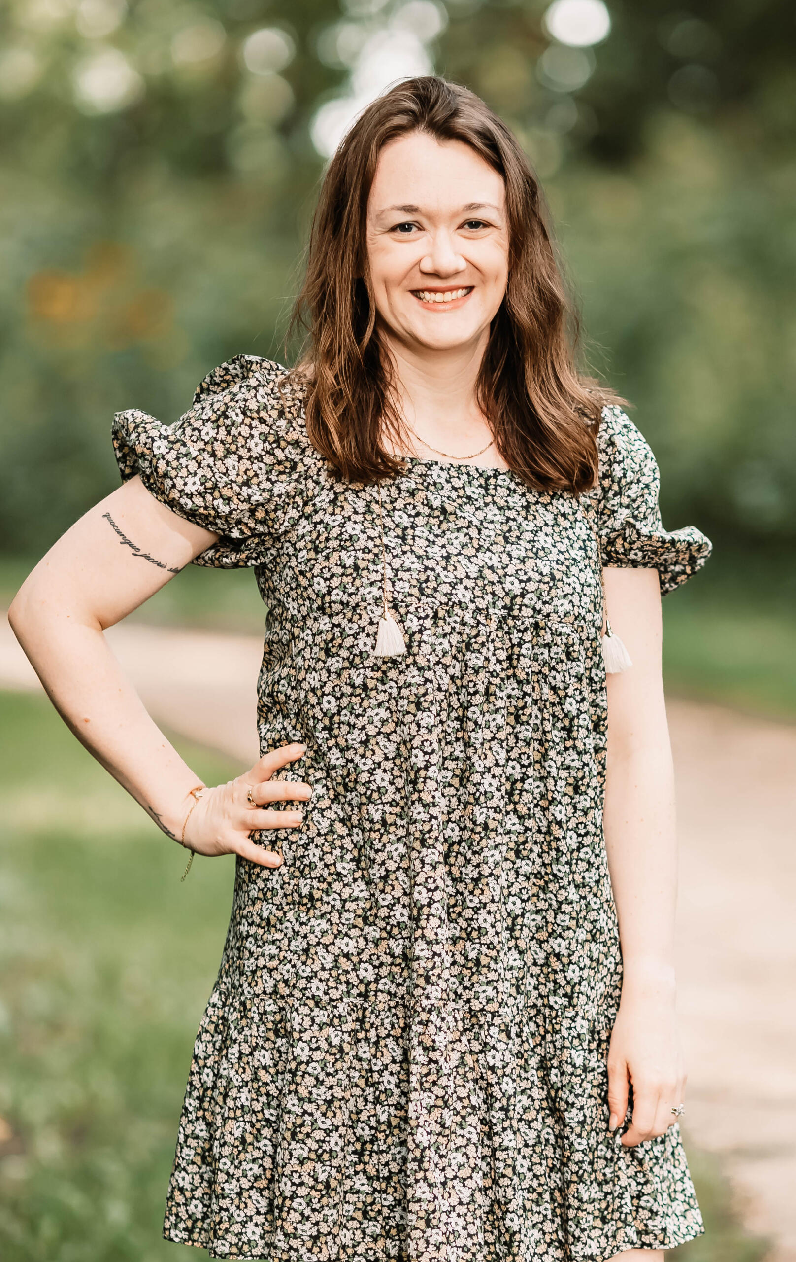 A desk with a laptop and ultrawide monitor